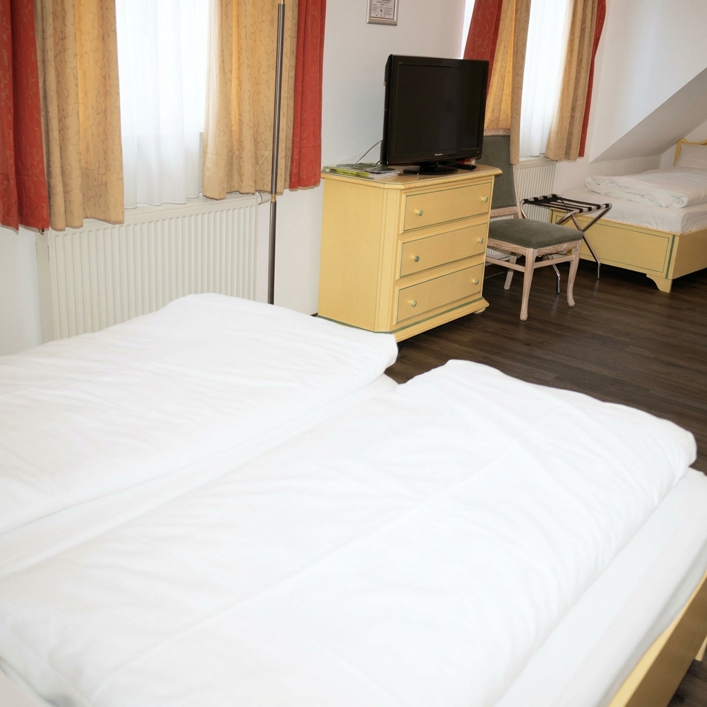 Dreibettzimmer
